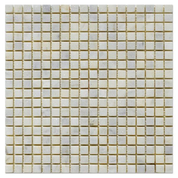 A Milano White tumbled mosaic half by half tile with white squares.