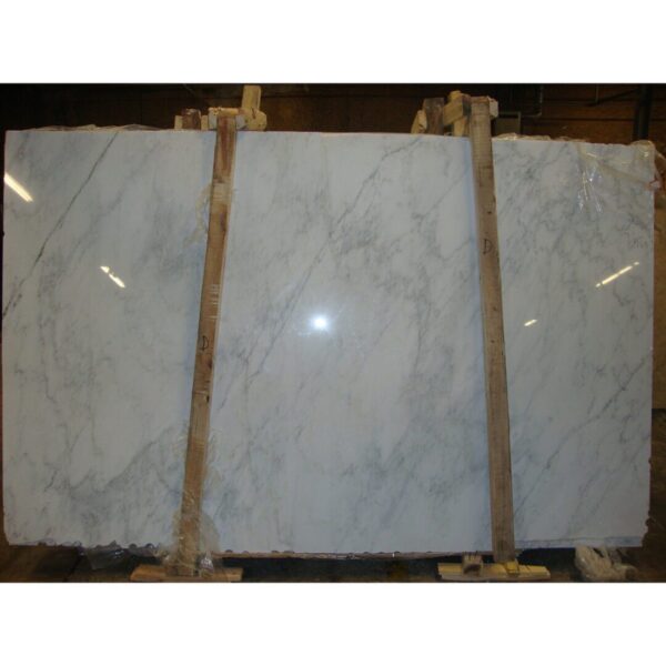 Calacatta White Slab Veiny Lot in a warehouse.