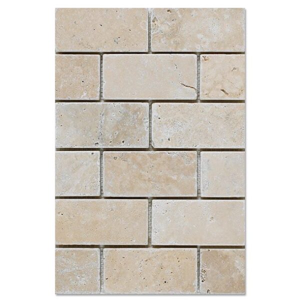 White travertine 2×4 mosaic tile in a beige color.