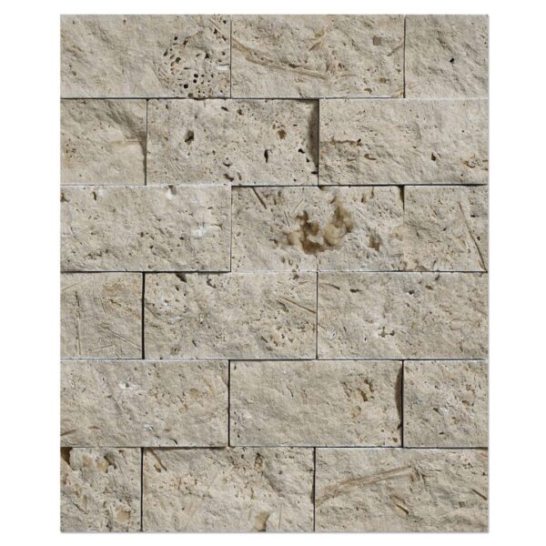 An image of a white travertine 2×4 split face mosaic tile on a wall.