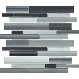 A gray and black tile wall with random strips of glass.