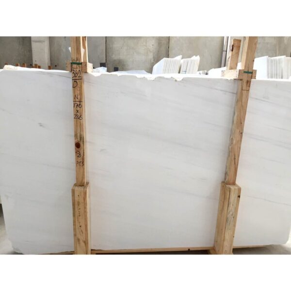A white marble slab in a crate.